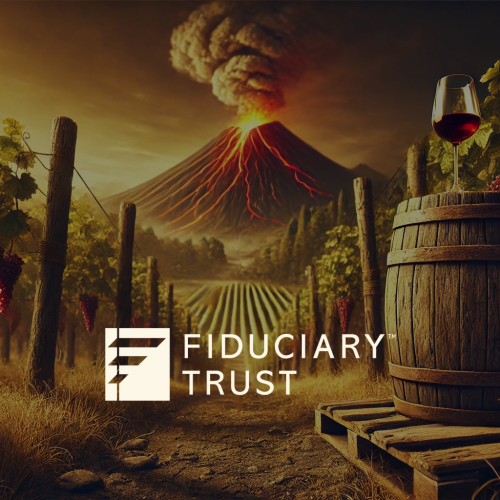 A vineyard scene with a volcano in the background, a barrel with a wine glass, and "Fiduciary Trust" text.